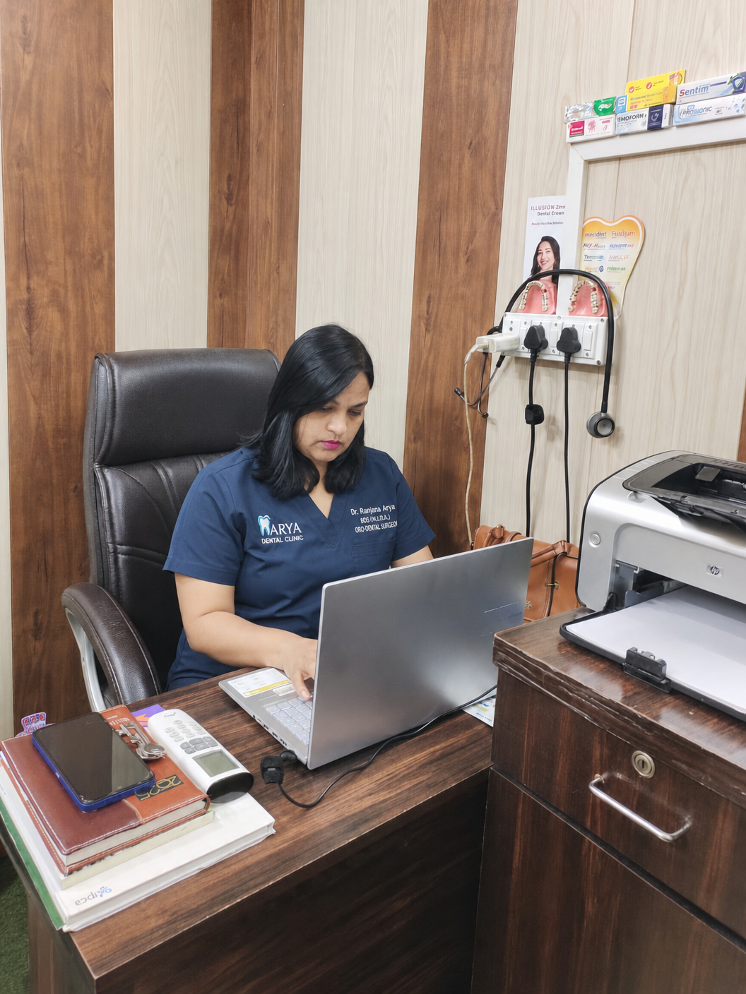 Dr. Ranjana Arya seated at the clinic